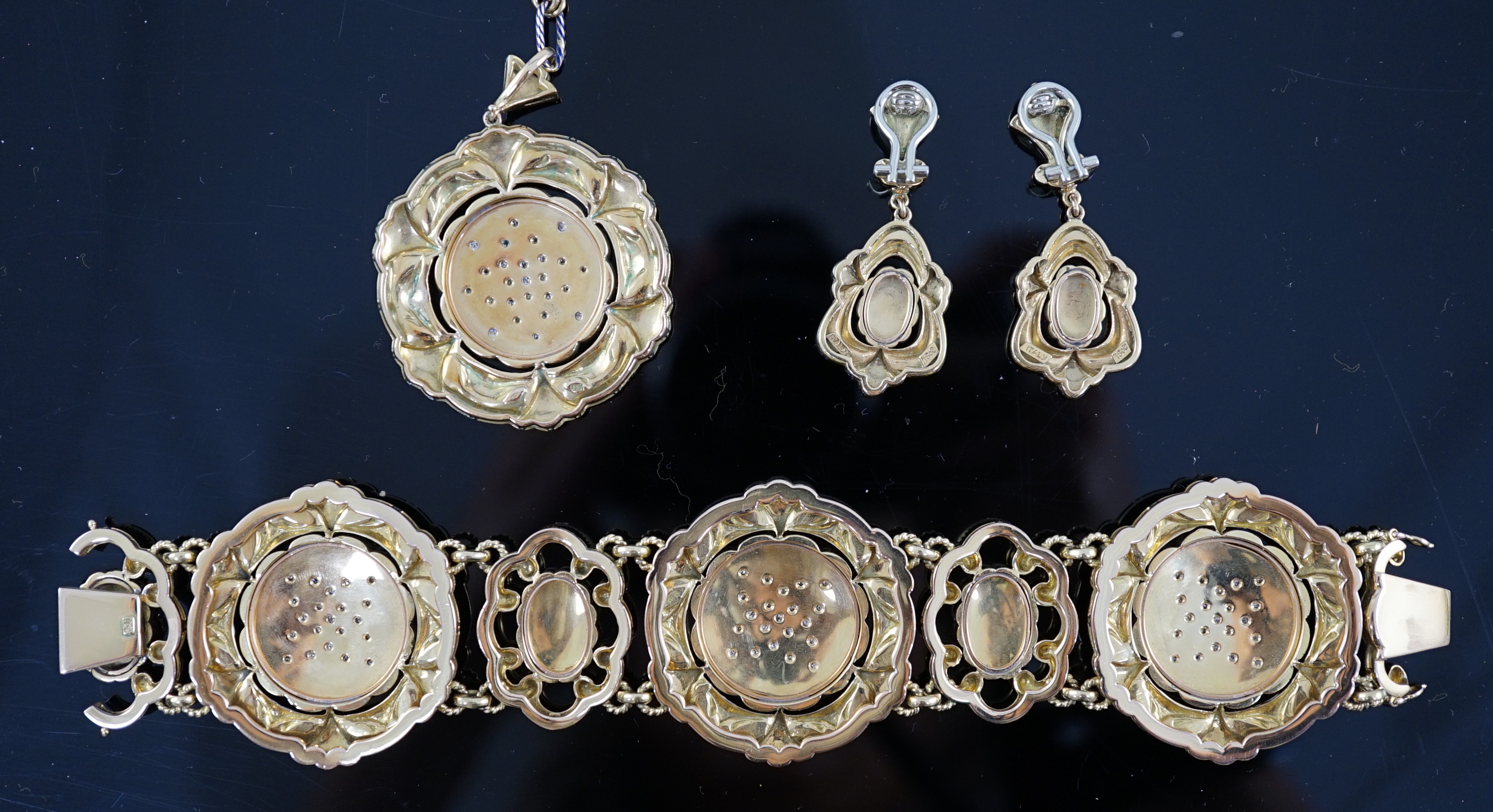 A late 19th century Swiss 18ct gold and polychrome enamelled suite of jewellery, retailed by E. Meister, Zurich